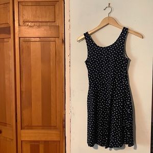 Navy blue with white polka dots.Divide (H&M) brand size 4.